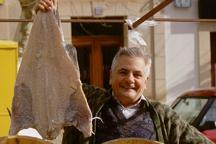 Selling fishes at market of Esporles - click to go to next image