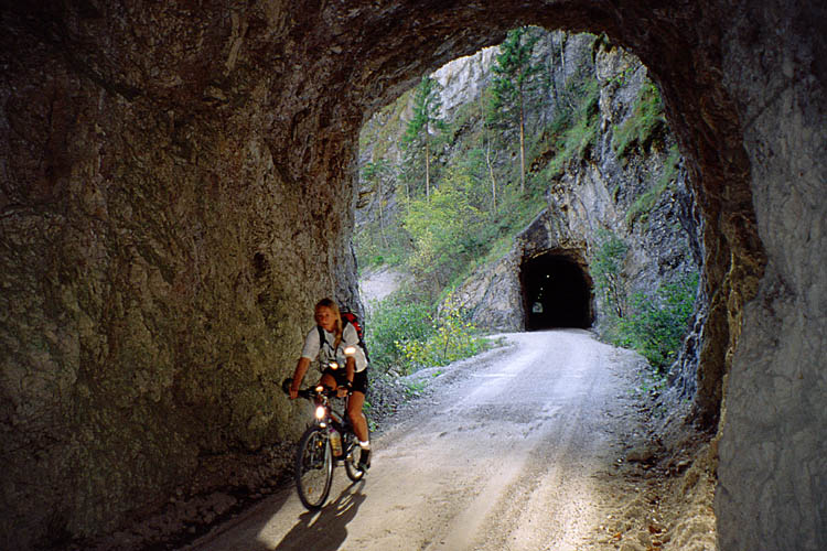 One tunnel follows the other on the former railroad track - click to go to next image